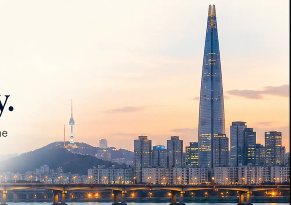 Seoul skyline at sunset — Lotte World Tower, Namsan Tower and the Han River